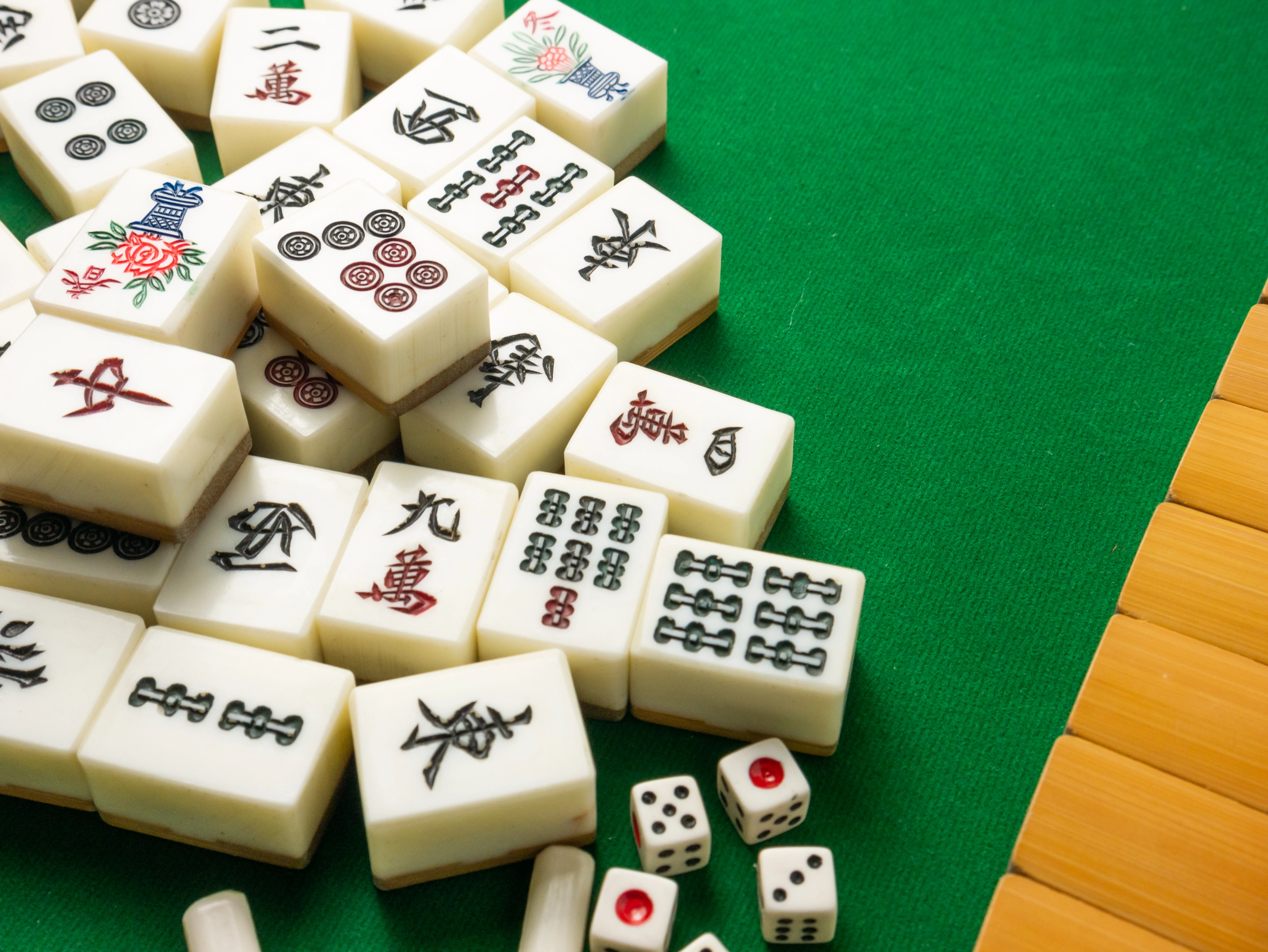 A picture of Mahjong tiles stacked together after shuffling making it the iconic go-to game for Chinese New Year
