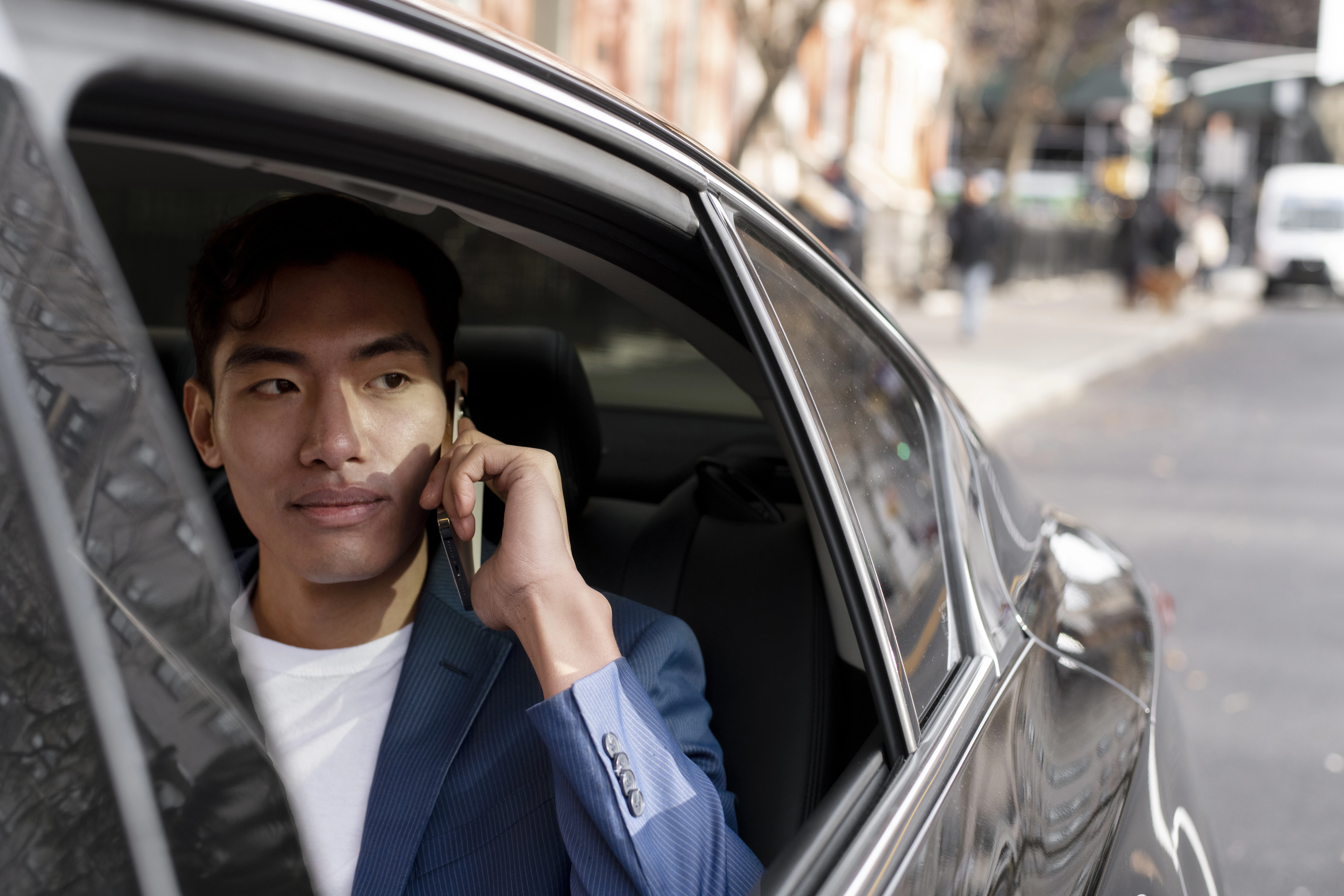 A man on his way home this Chinese New on his phone. Showing love and commitment to his family