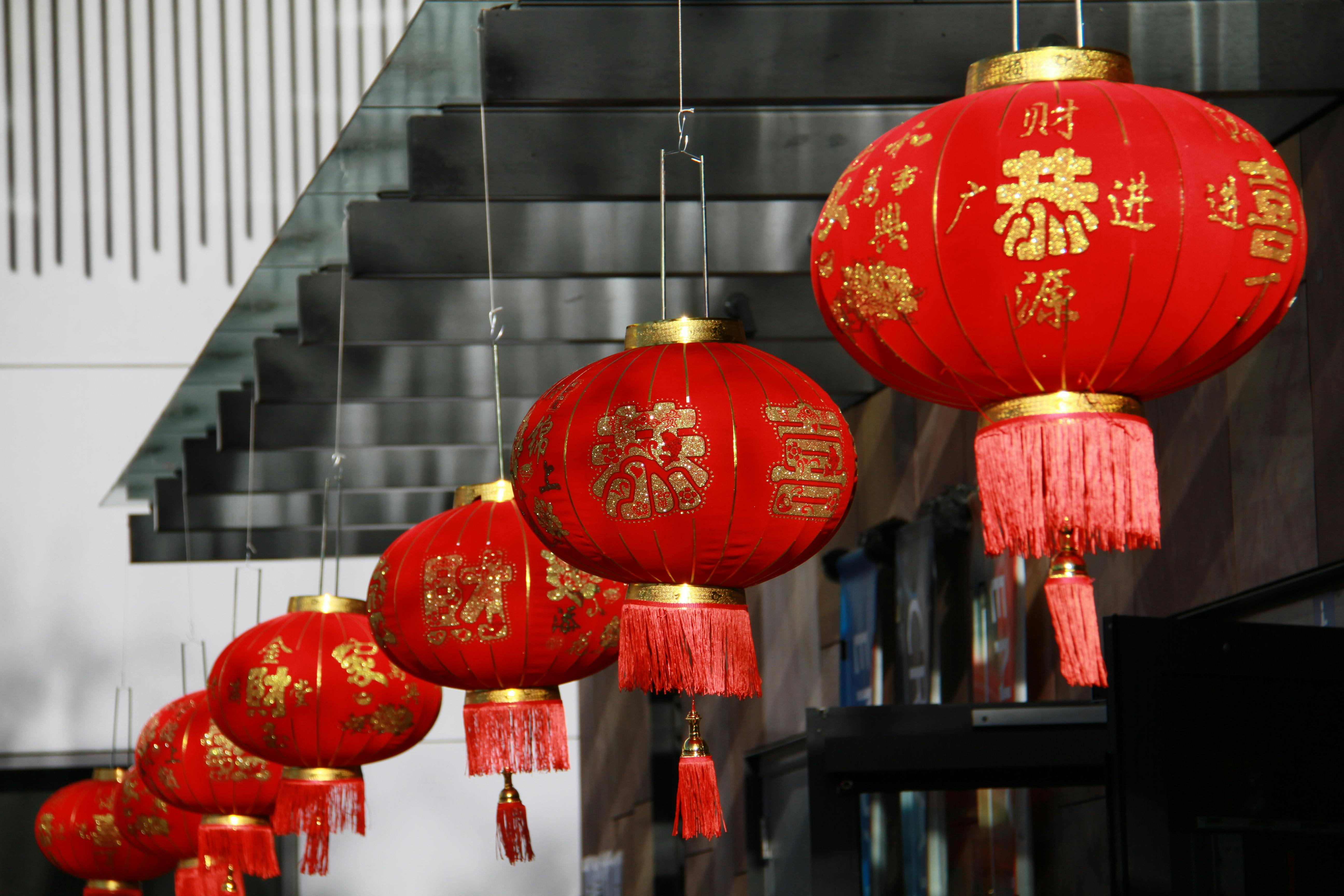 a long queue of red lanterns bringing joy, protection, good luck and fortune